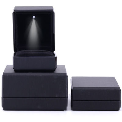 กล่องเครื่องประดับแสง LED สีดําที่ทําด้วยมือ สําหรับกระเป๋าบรรจุหนังโลโก้ที่กําหนดเองของฮานฮอง