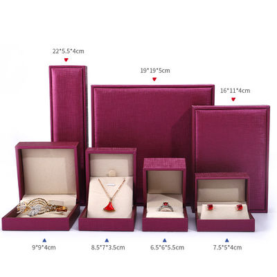 จีนผลิต Wholesale Luxury Jewellery กล่องบรรจุ Custom high end สร้อยคอ แขนหู แหวนบรรจุกุหลาบ สีแดง PU กล่องเครื่องประดับหนังที่มีโลโก้