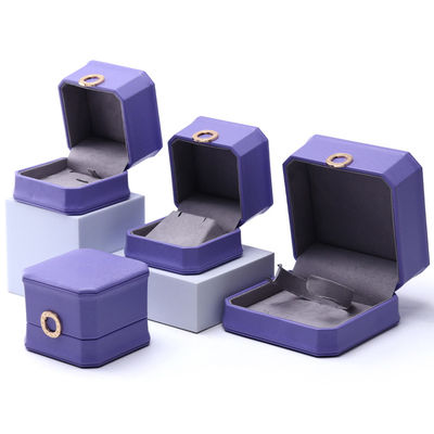 ซื้อ กล่องเครื่องประดับหนัง PU สีม่วงทรงแปดเหลี่ยมที่น่าหลงใหลสําหรับแหวนหู online manufacture